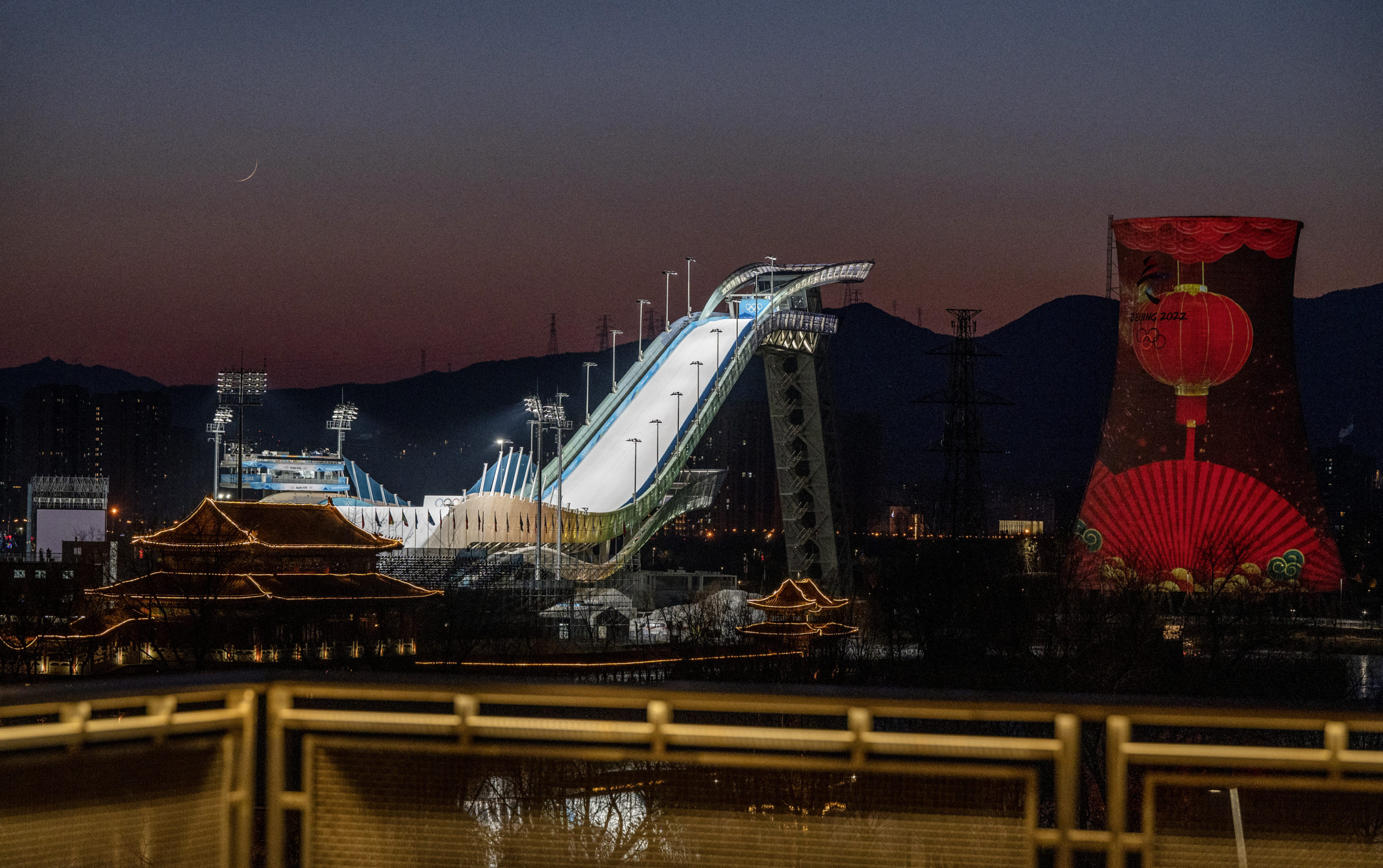 BEIJING, CHINA – FEBRUARY 2: The Big Air freestyle venue is seen at dusk at the Beijing 2022 Winter Olympics Torch Relay at Shougang Park, which will host freestyle skiing, on February 2, 2022 in Beijing, China. The games are set to open on February 4th. (Photo by Kevin Frayer/Getty Images) 