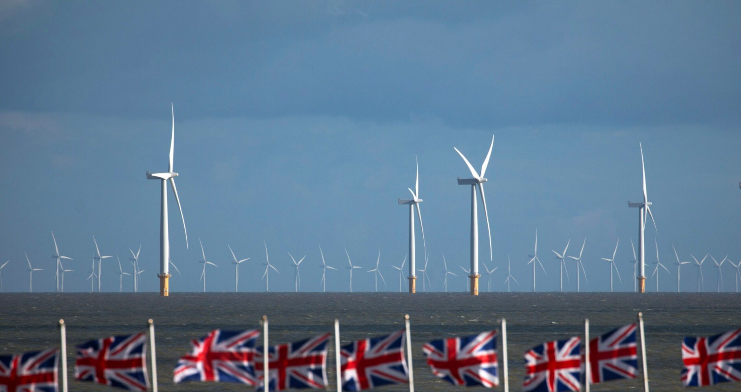Wind turbines off the coast of Essex, UK. The government says the per-unit price of offshore wind has dropped by nearly 70 per cent between 2015 and 2022 (Photo: Chris Ratcliffe/Bloomberg) 