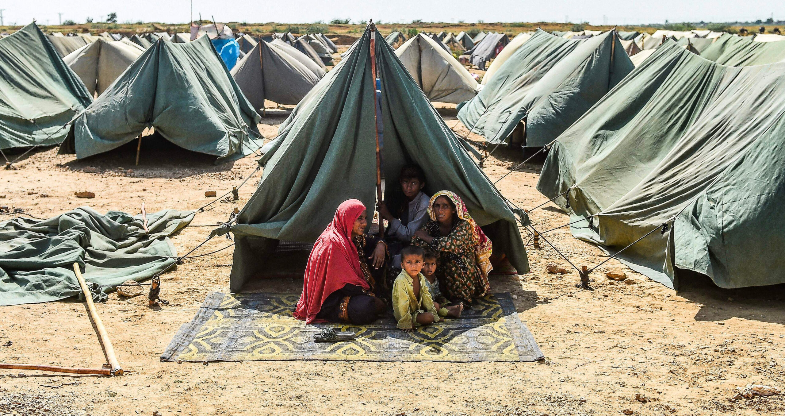 A makeshift tent camp in Pakistan, set up following the 2022 floods, which
displaced eight million citizens and caused damage totalling nearly $15bn (Photo: Rizwan Tabassum/AFP via Getty Images) 