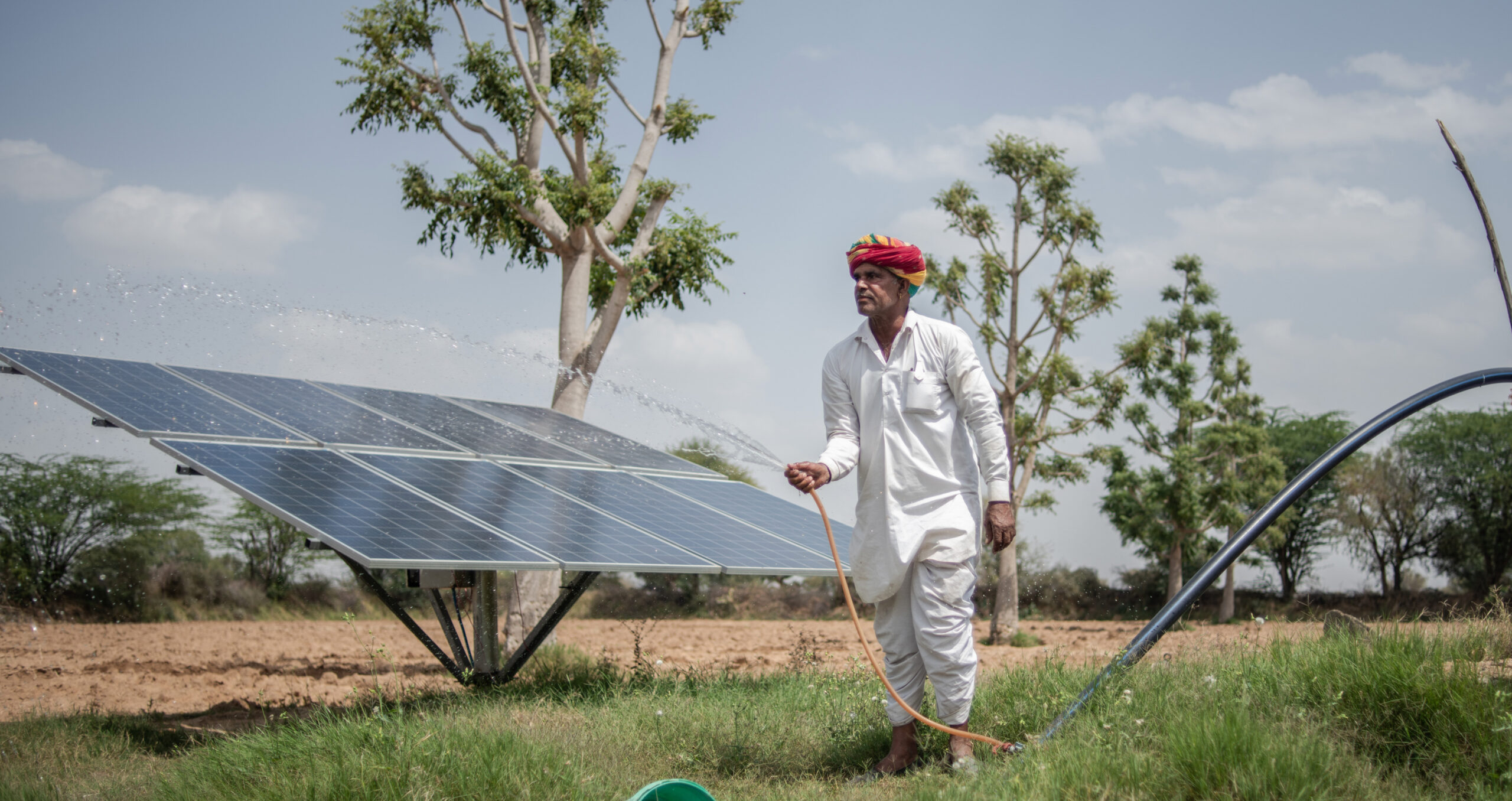 Solar panels powering a water pump on an Indian farm. The sustainability bonds market aims to finance projects that can bring social benefits as well as sustainable outcomes. (Photo: Rebecca Conway/Getty Images) 