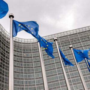 EU flags flying outside European Commission building