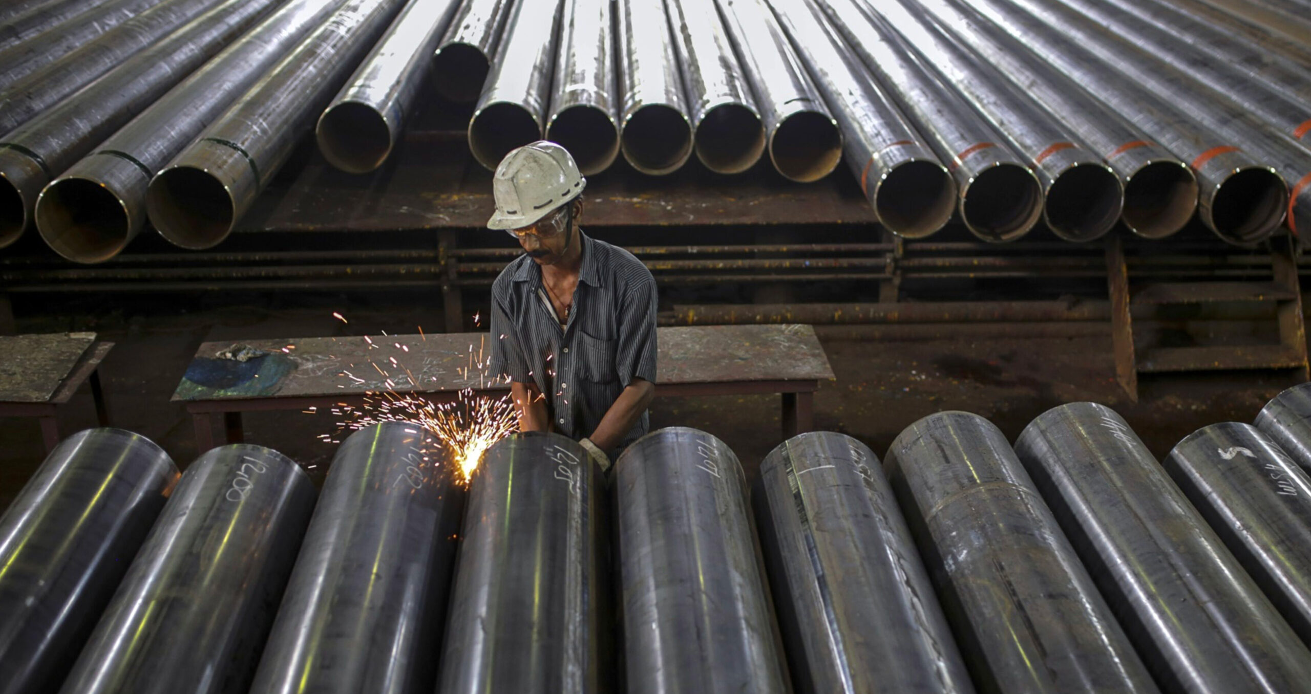 A worker at the finishing line of an Indian steel tube plant. Steel is among other so-called hard-to-abate industries lobbying the government over the EU CBAM. (Photo: Dhiraj Singh/Bloomberg) 