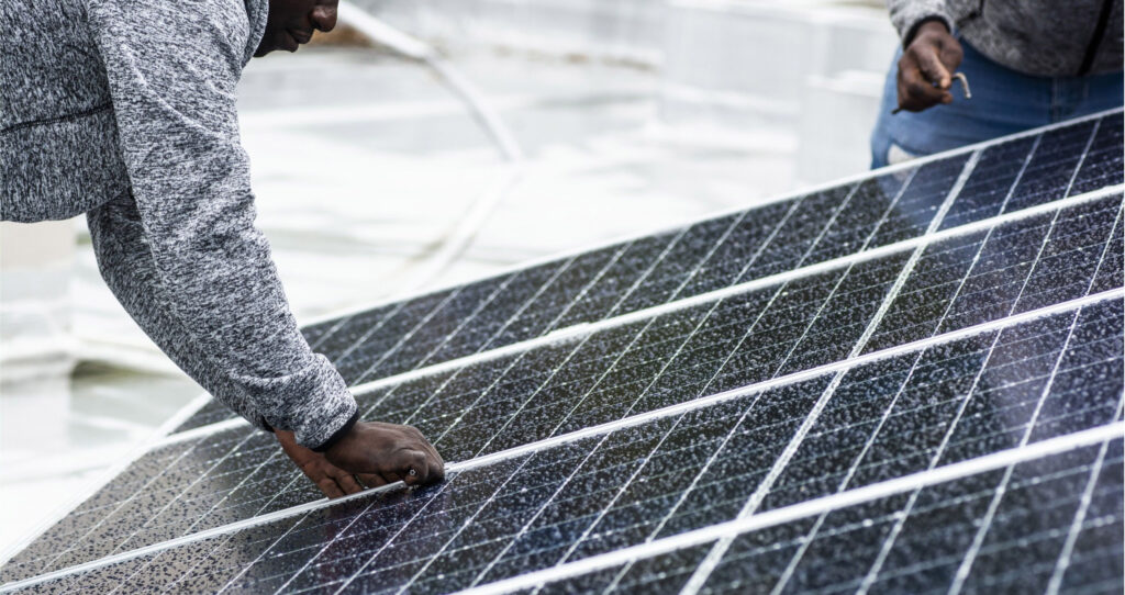 Installing solar panels in Africa