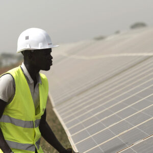 Inspecting solar panels in Senegal