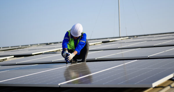 Installing solar panels on rooftop
