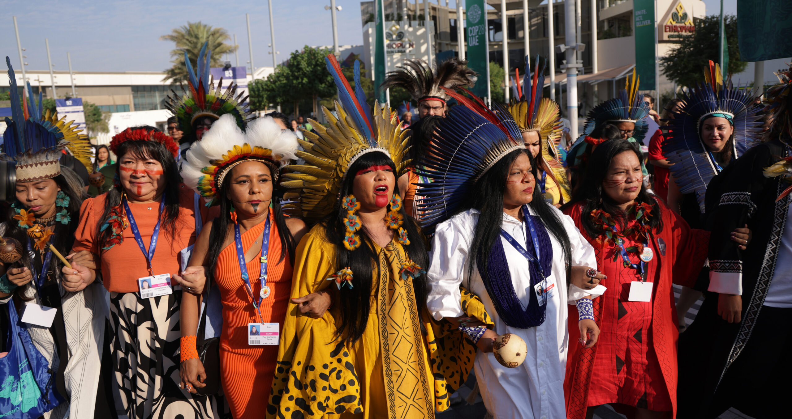 Representatives of indigenous groups from Brazil at COP28. Brazil is developing its compliance carbon market with a focus on redistributing income to stakeholders like indigenous communities (Sean Gallup/Getty Images) 