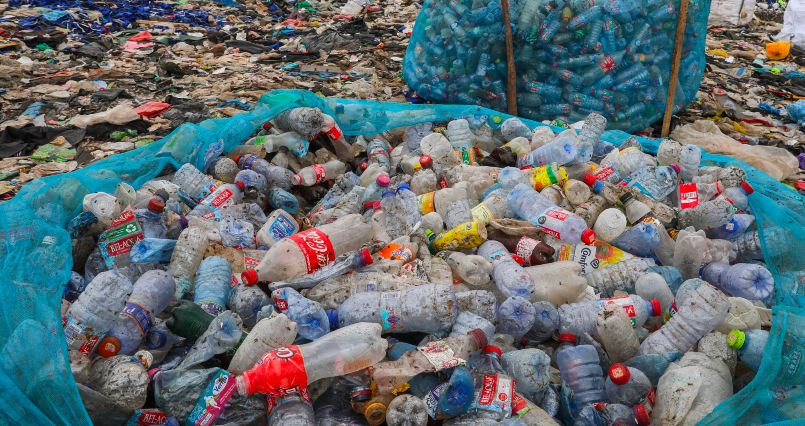 Collected bottles at a landfill site in Ghana. Experts say communities in the global south often carry the heaviest burden of plastic leakage and pollution (Photo: Nipah Dennis/Bloomberg) 