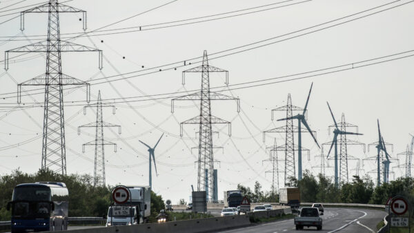 Electricity pylons near wind turbines in Austria