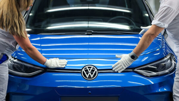 Employees make final checks on Volkswagen car