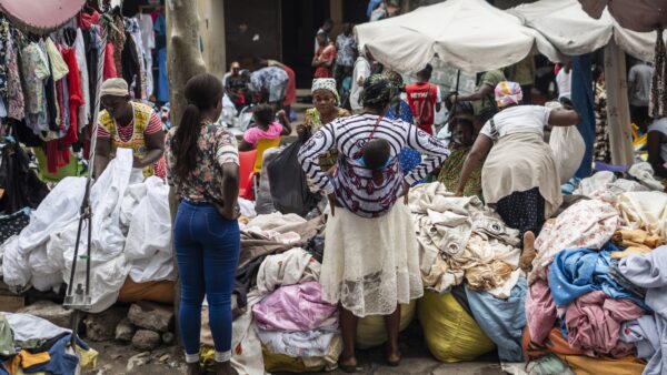 Vendors wait for customers at the Kantamanto textile market in Accra, Ghana